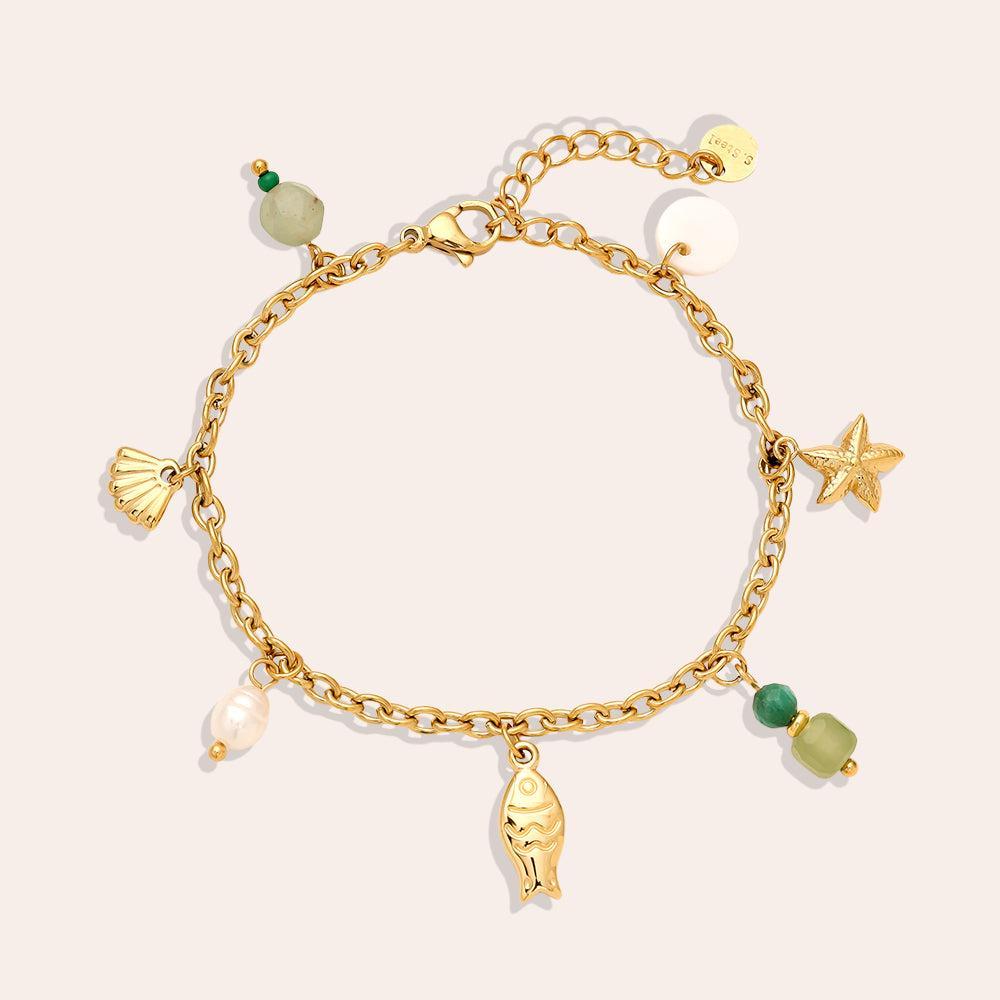 „Calypsi“ – Edelstahl-Arm­kette mit Süßwasserperlen & Meeres-Charms, 16 cm + 3 cm-Goldharmonie