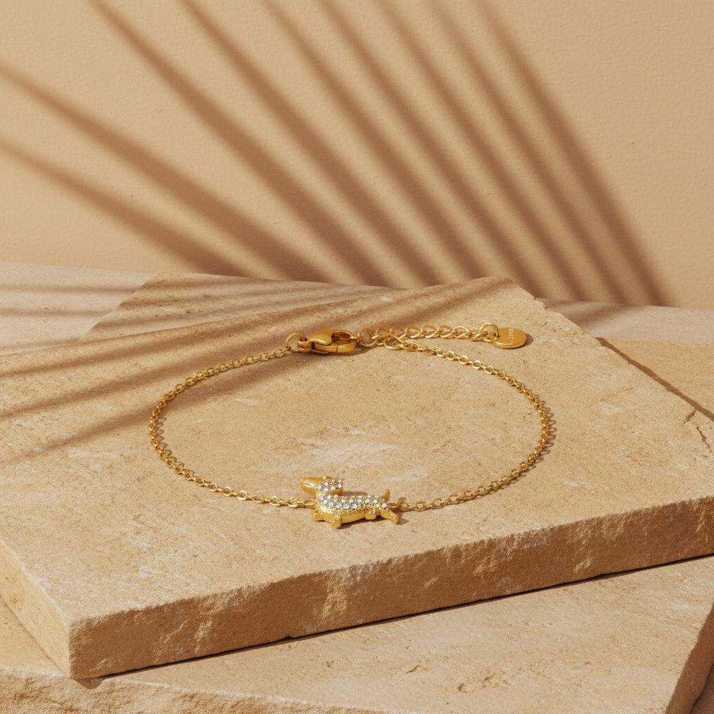 „Canella“ – Edelstahl-Arm­kette mit Zirkonia-Hundecharm, 17 cm + 3 cm
