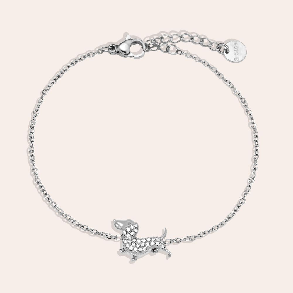 „Canella“ – Edelstahl-Arm­kette mit Zirkonia-Hundecharm, 17 cm + 3 cm
