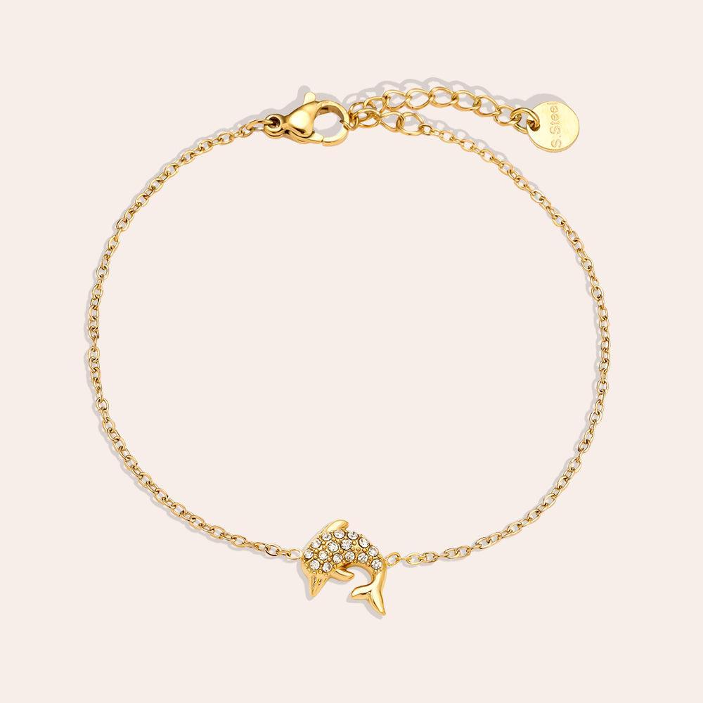 „Delphara“ – Edelstahl-Armkette mit funkelndem Delfin-Anhänger (17 cm + 3 cm)-Goldharmonie