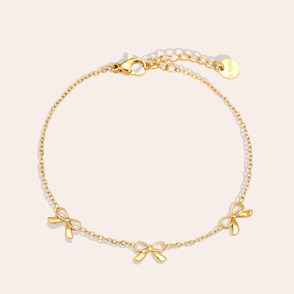 "Larola" Tiny Bowtie Edelstahl Armband-Goldharmonie