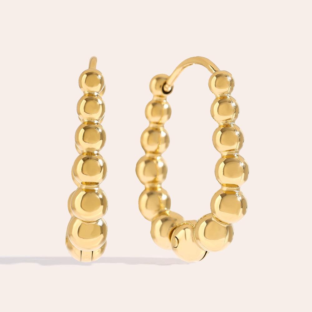 „Lorasiraa“ Dot Cycle Ohrringe-Goldharmonie