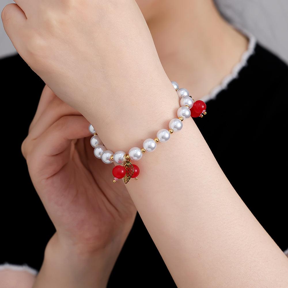 „Mirabellé“ – 3-teiliges Edelstahl-Armbandset mit roten Frucht-Charms, 17 cm