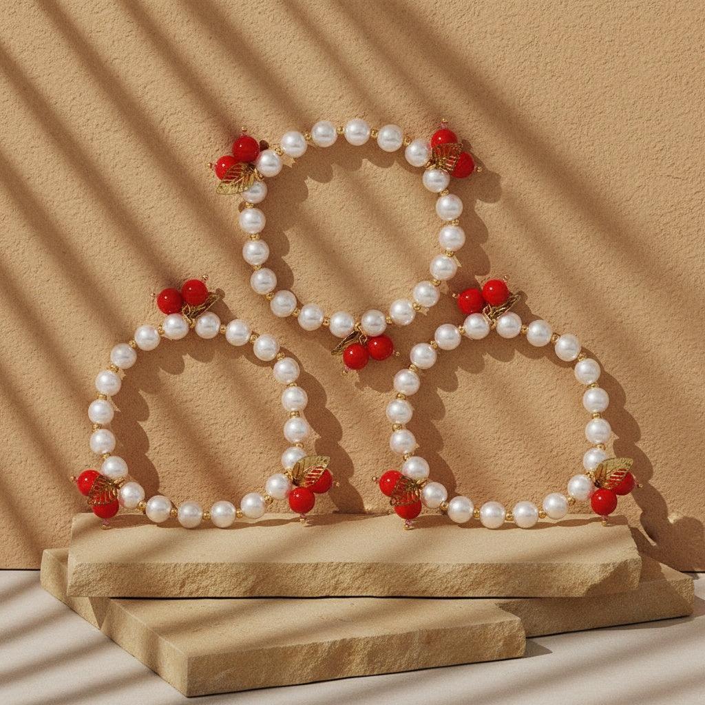 „Mirabellé“ – 3-teiliges Edelstahl-Armbandset mit roten Frucht-Charms, 17 cm