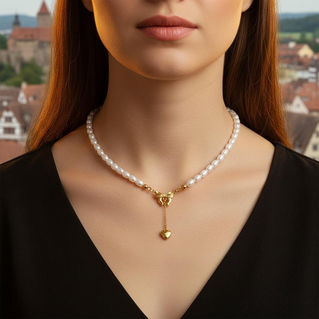 "Norariaine" Bowtie With Heart In Pearl Chain Edelstahl Halskette
