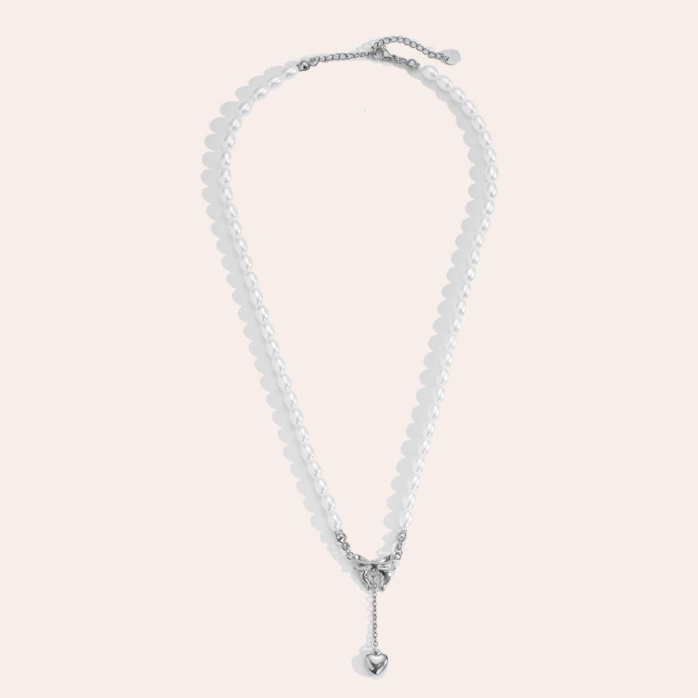 "Norariaine" Bowtie With Heart In Pearl Chain Edelstahl Halskette