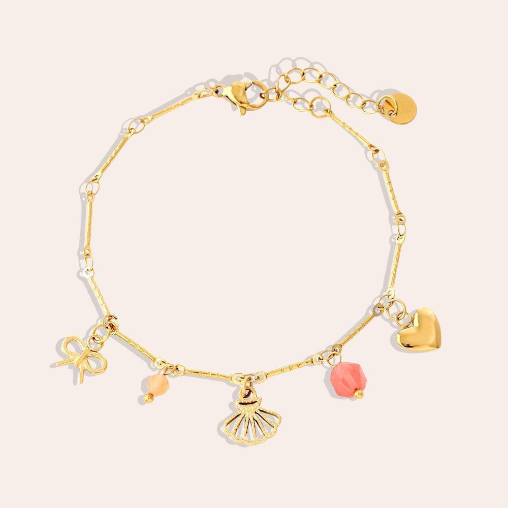 „Novinara“ Many Sweet Charms Armband-Goldharmonie