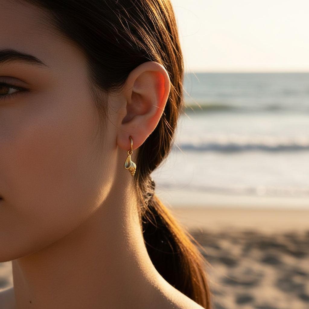 „Savitara“ Conch Ohrringe