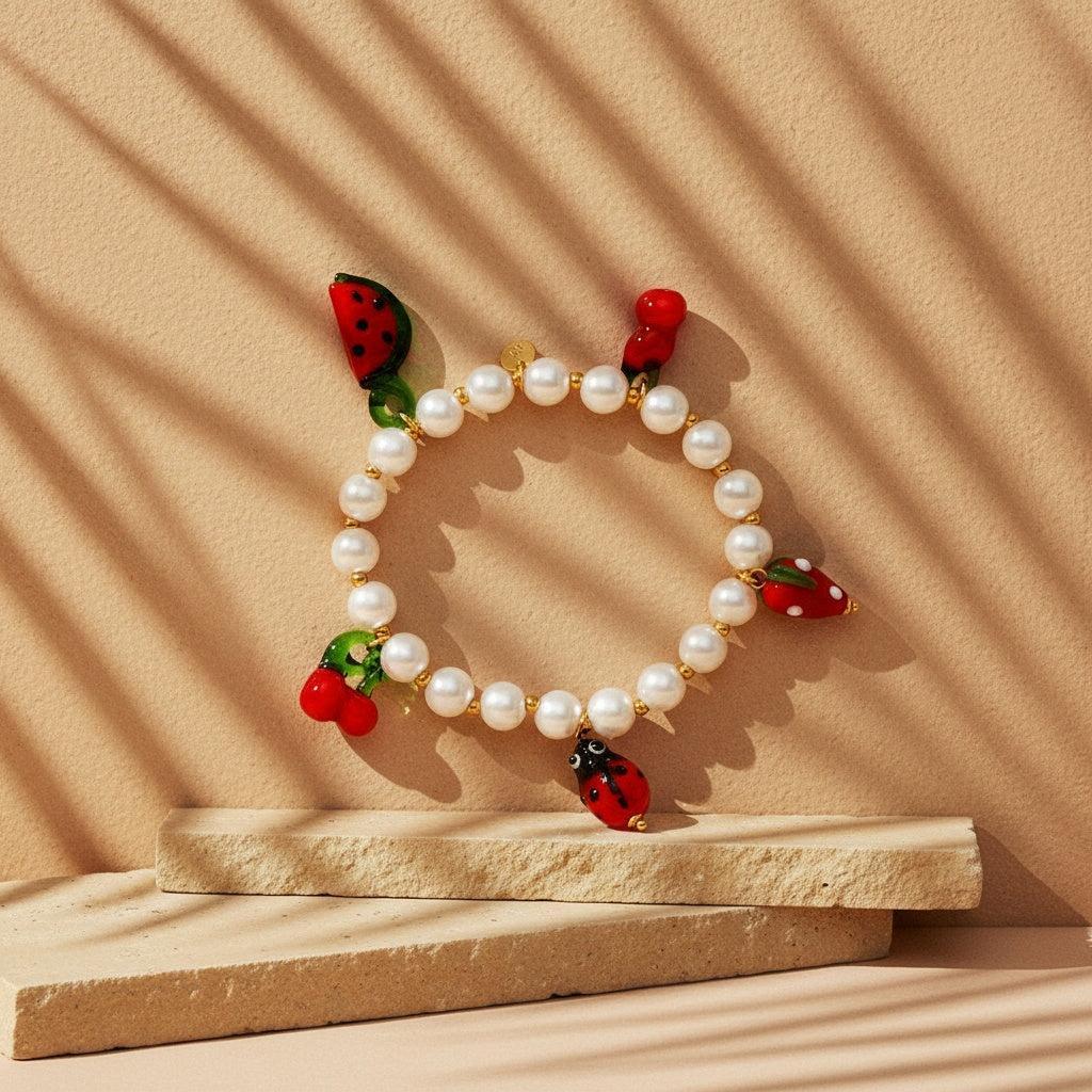 „Solariva“ Fruit In Pearl Chain Armband