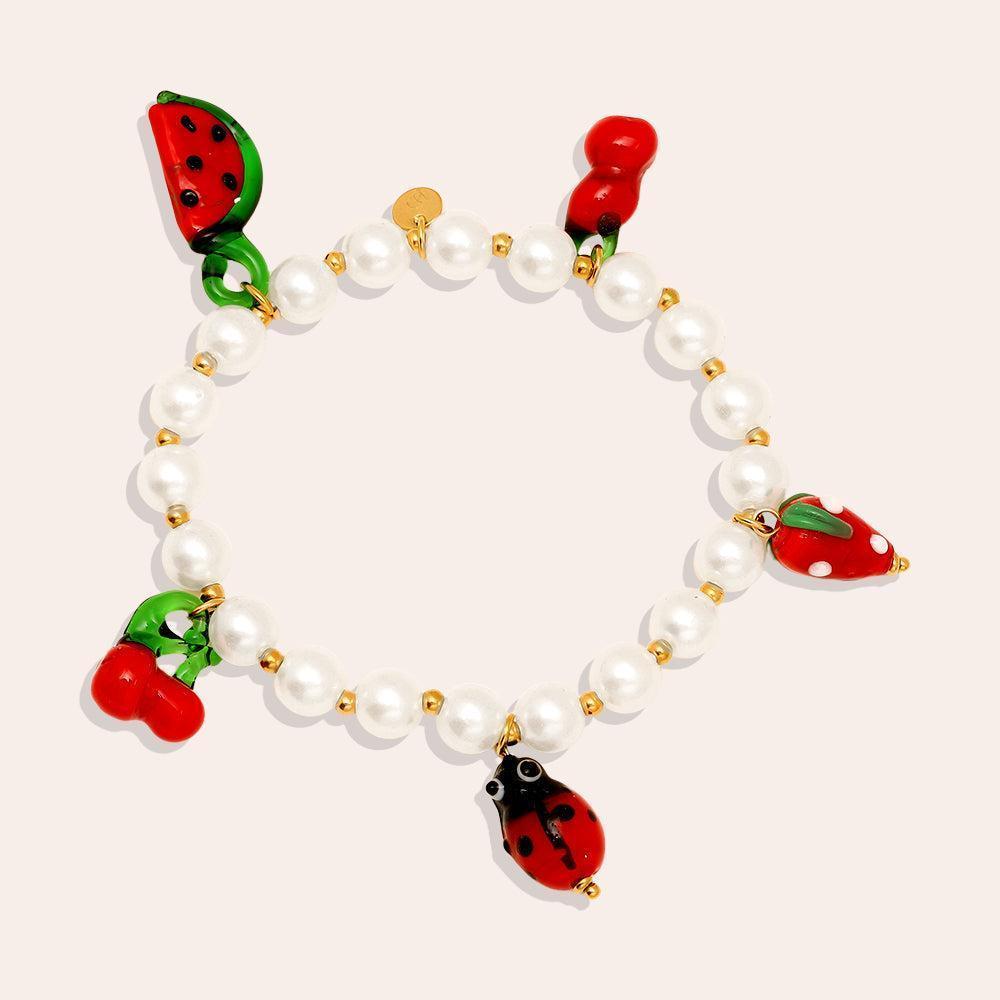 „Solariva“ Fruit In Pearl Chain Armband-Goldharmonie