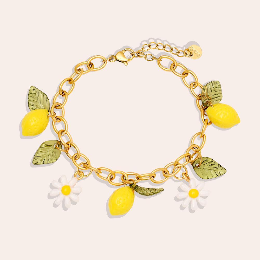 „Zestia“ – Edelstahl-Arm­kette mit Zitronen-Charm, 17 cm + 3 cm-Goldharmonie